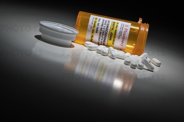 Hydrocodone pills and prescription bottle with non proprietary label. no model release required