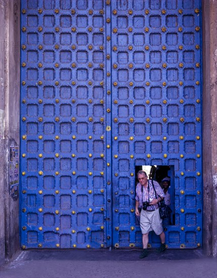 A tourist crossing the Main door in Varadarajaswamy temple