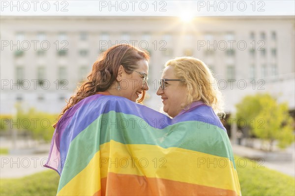 Lesbian women couple in love embracing each other