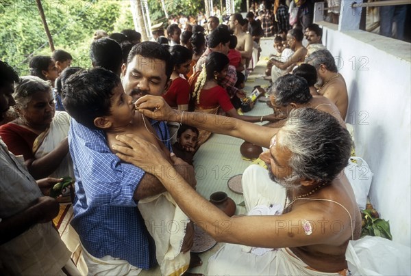 Ezhuthiniruthu Ceremony on Vijayadasami day in Saraswathy temple at Panachikadu near Kottayam