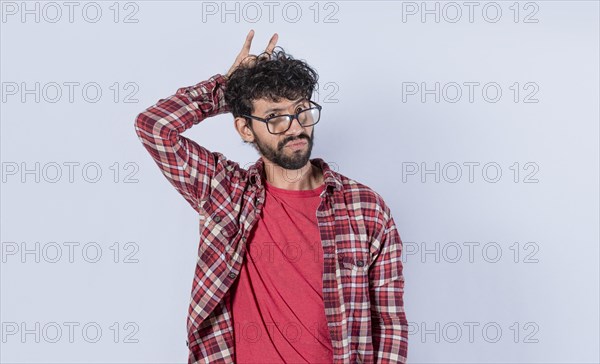 Man with fingers cuckolding