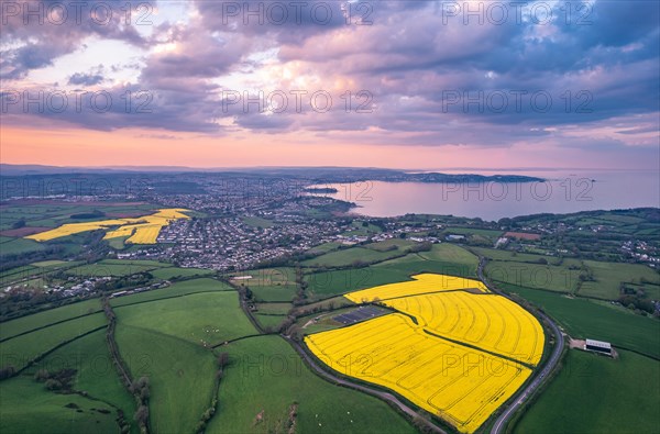 Sunset over Devon Fields and Farmlands from a drone