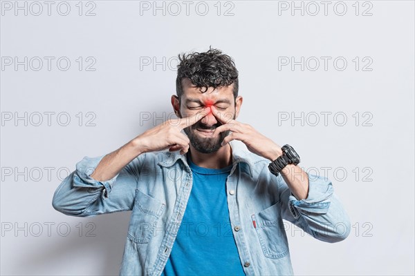 Man with nasal bridge headache