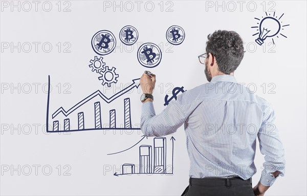 Business man drawing finance