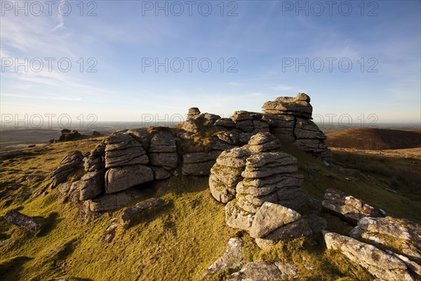 View of granite outcrop in bog habitat in the evening sun