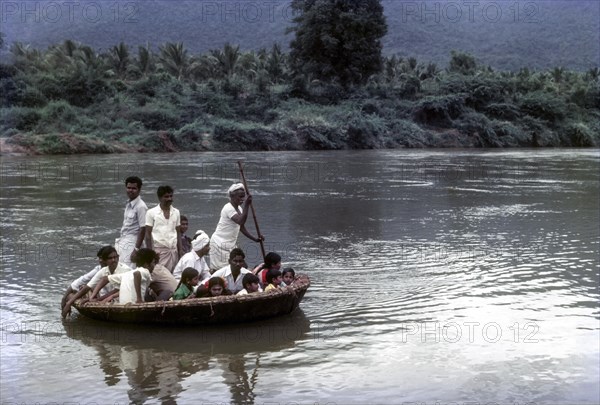 People enjoying Coracle Ride in River Bhavani at Nellithurai near Mettupalayam