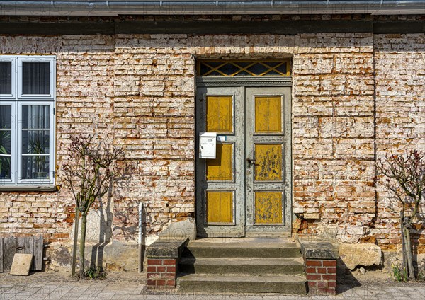 Unplastered old house in Putbus