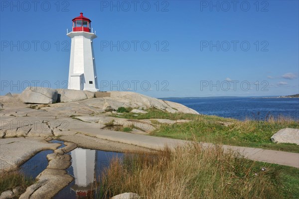 View of granite rock lighthouse