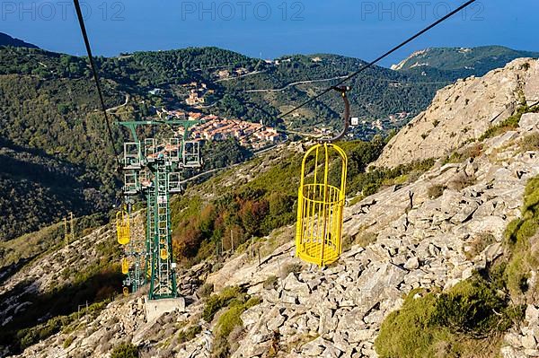 Cable car Cabinovia Monte Capanne with open gondola Cable car gondola standing gondola on mountain Monte Capanne