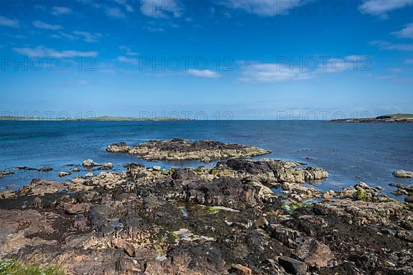 Coastal scene with view of the island of Papa Stour