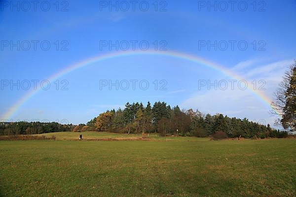 Rainbow over field and woodland near Eschweiler