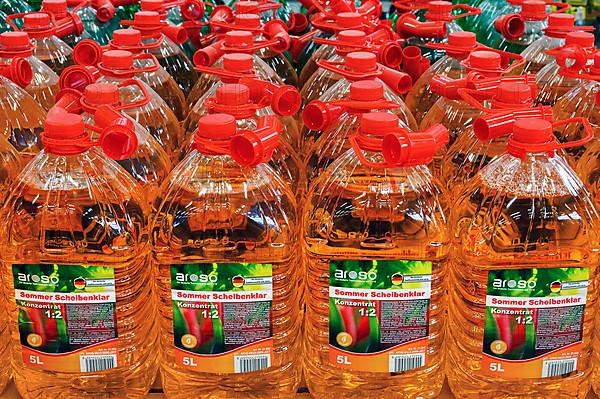 Plastic bottles with disc clear in a DIY store