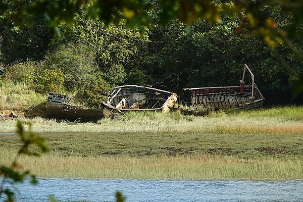 Wrecks of former fishing boats at the Anse du Moulin Neuf inlet