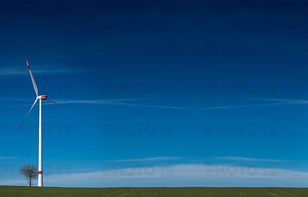 A windmill in the field with copy space