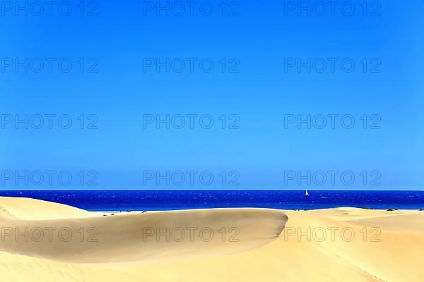 The dunes of Playa Del Ingles with a view of the Atlantic Ocean. San Bartolome de Tirajana, Gran Canaria