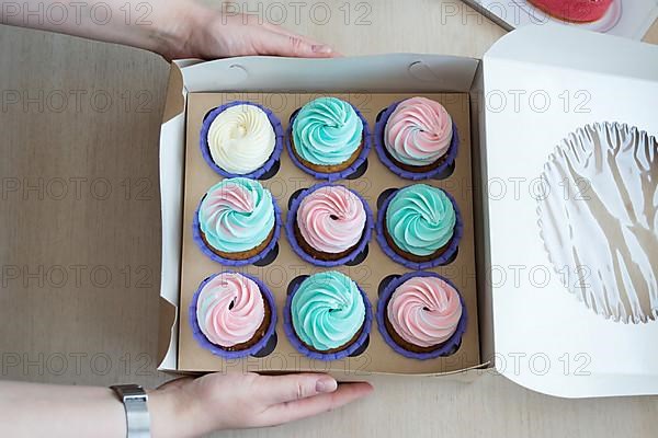 Flatlay cupcake box on the table