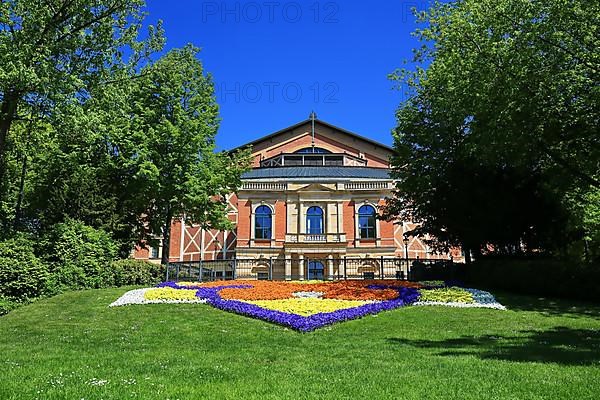 The Festspielhaus with colourful flowerbeds in the centre of Bayreuth. Bayreuth