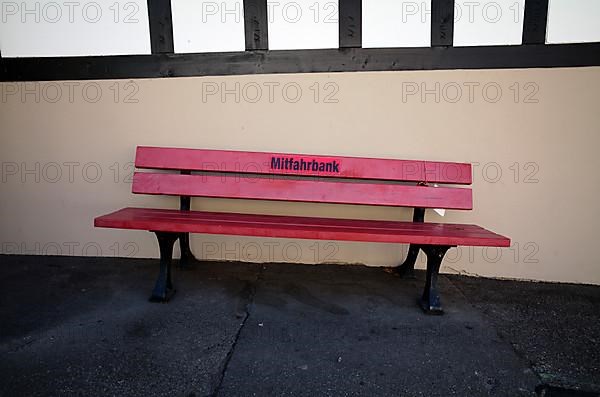 Red Carpool bench