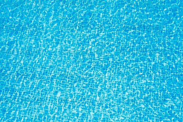 Clean blue water in pool