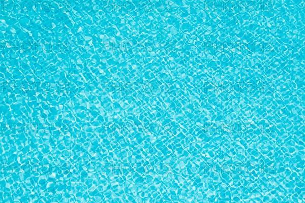 Clean blue water in pool