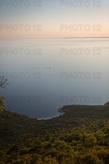 Mediterranean coast on the Adriatic Sea with boat and water