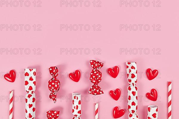 Party flat lay with heart ornaments