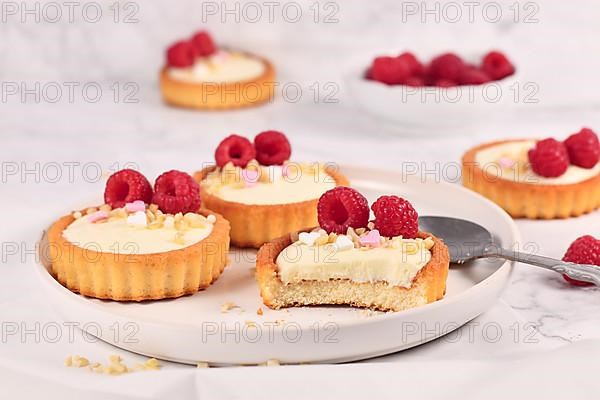 Small tartlet pastries with white cream