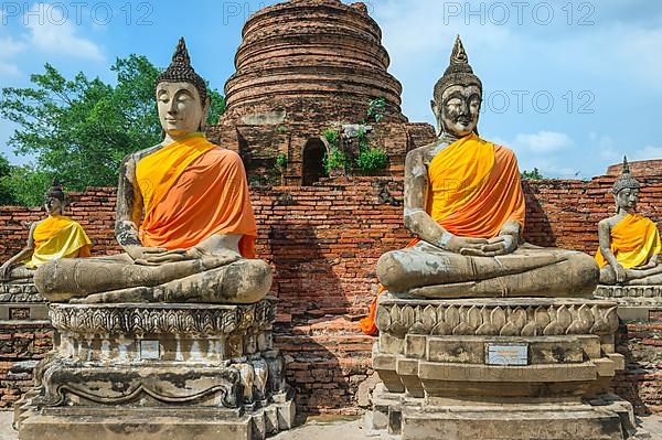 Buddha statues around the central stupa