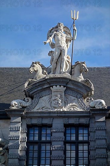 Statue of the Roman god Neptune with trident above the entrance to the Old Fish Market