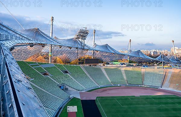 View over Olympic Stadium with rows of seats and football pitch