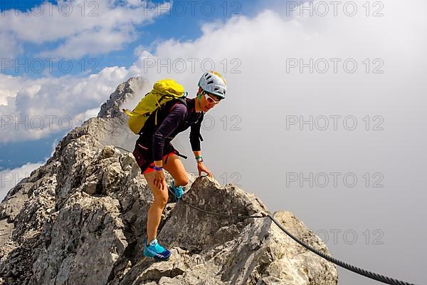 Mountaineer climbing on the Watzmann ridge