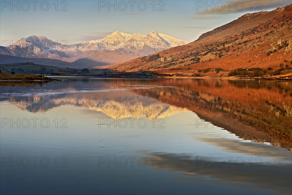 View across the lake towards the mountain at sunrise