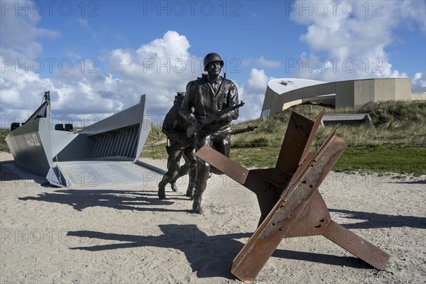 Czech hedgehog and landing craft in front of the Musee du Debarquement Utah Beach