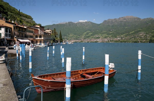 Boats in the harbour of the town on the lake island