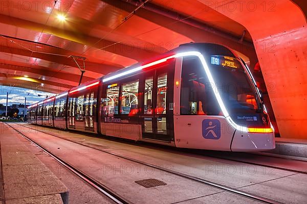 Modern tramway Alstom Citadis X05 line T9 at Trois Communes stop Public transport Transport in Paris