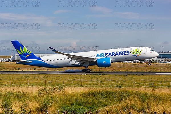 An Air Caraibes Airbus A350-900 aircraft with registration F-HHAV at Paris Orly Airport