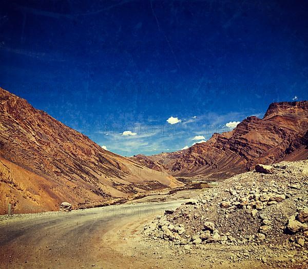 Vintage retro effect filtered hipster style travel image of Manali-Leh road to Ladakh in Indian Himalayas with grunge texture overlaid. Ladakh