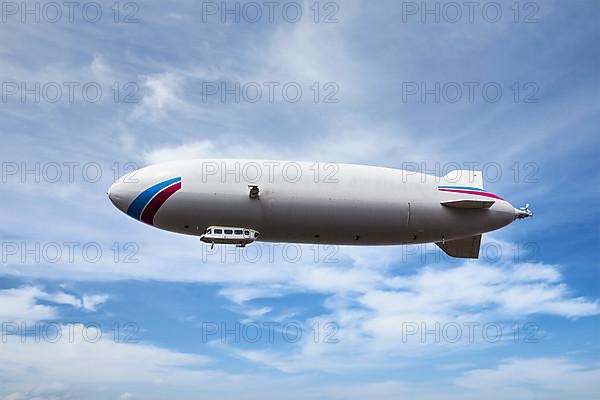 Zeppelin dirigible airship in sky