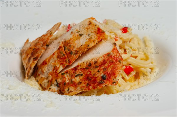 Closeup of plate with pasta
