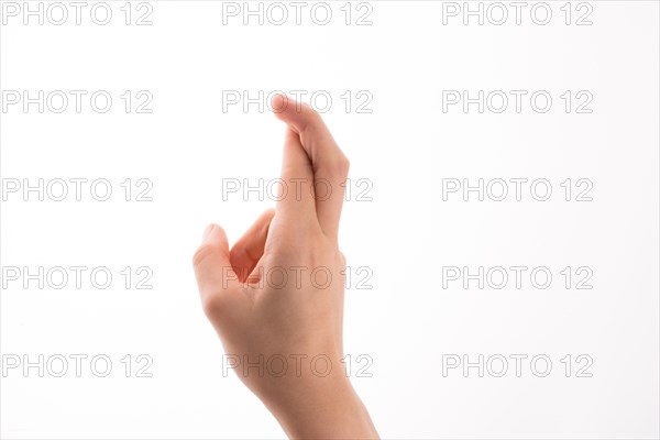 Hand tied with a rope like a ribbon on a white background