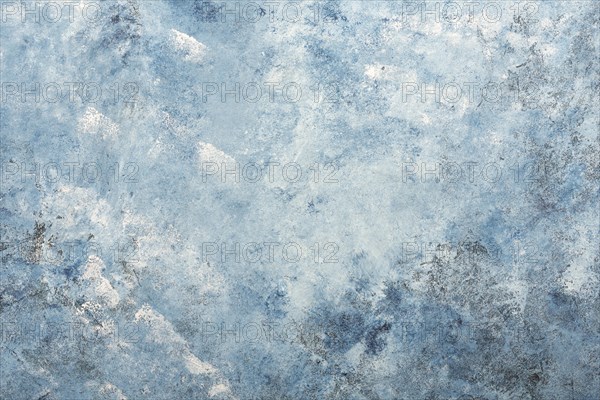 Dark blue textured stucco wall background