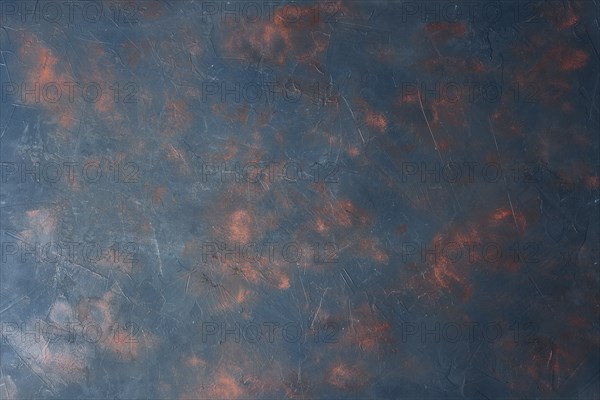 Abstract rusty pale blue-orange background