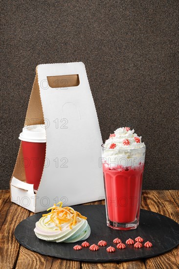 Strawberry coffee with whipped cream and meringue cake