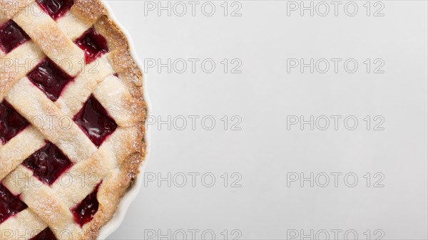 Pie with strawberry jam copy space