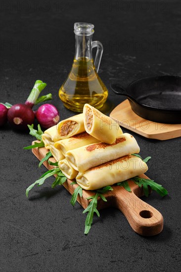 Thin crepe stuffed with chicken offal