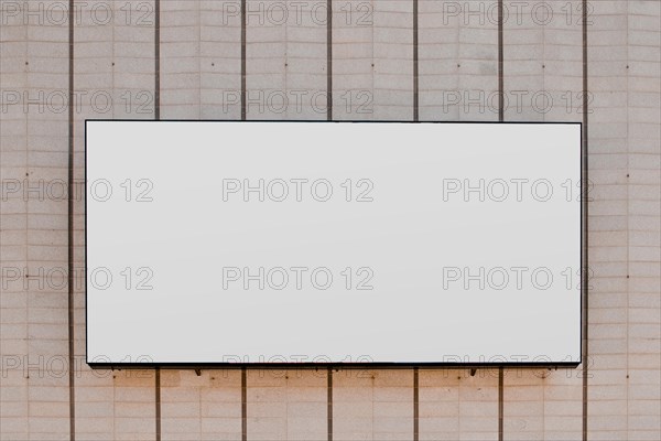 Rectangular white blank billboard striped wall