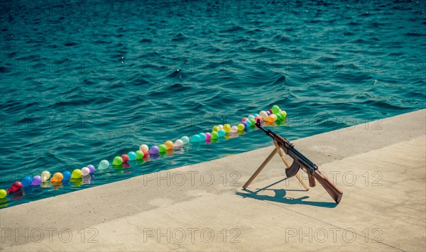 Balloon on a string on water for shooting game