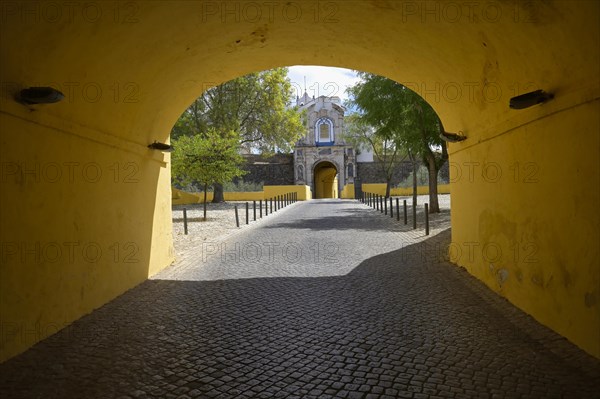 Outer Corner Gate and view over Our Lady of the Conception Hermitage and Chapel on top of the inner gate
