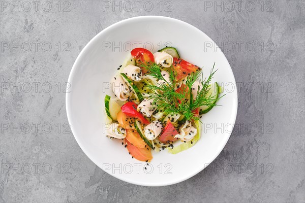 Top view of salad with ham