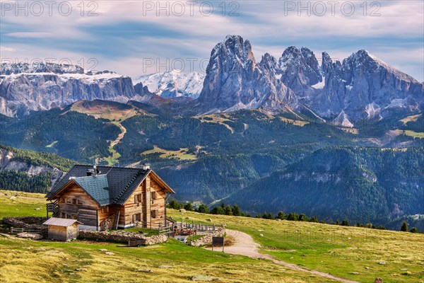Raschoetzhuette on the Raschoetzalm in front of the Sella Group 3152m